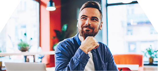 man smiling with hand on chin wondering about frequently asked questions