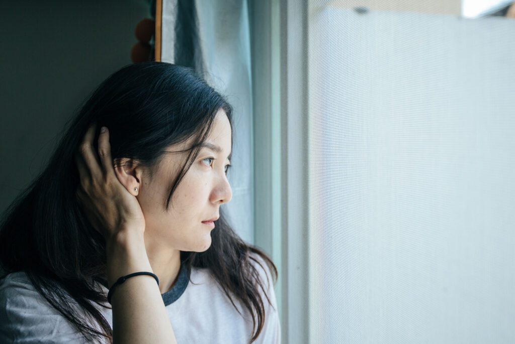 a woman struggles to manage her anxiety without professional help