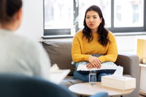 a woman participates in a roxicodone abuse treatment program